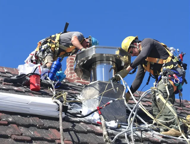 Protective chimney cap installed by Clinton Chimney Sweep in Clinton, CT